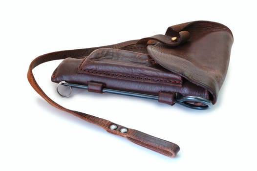 Old brown leather military holster on overwhite background.