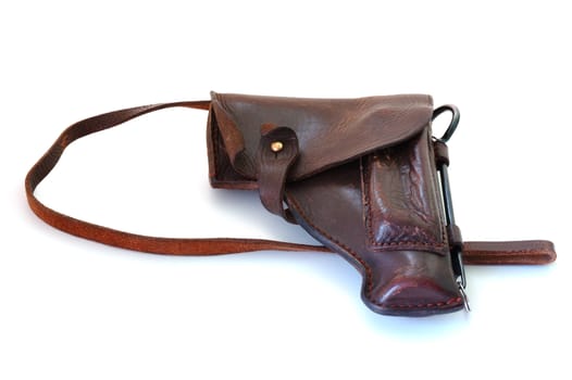 Old brown leather military holster on overwhite background.