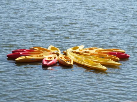 Kayaks on lake in set in star shape