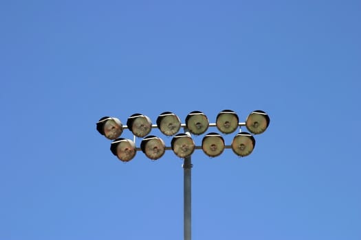 Floodlight from a football stadium with the sky as a background.