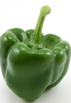 Single fresh green organic pepper, on white background