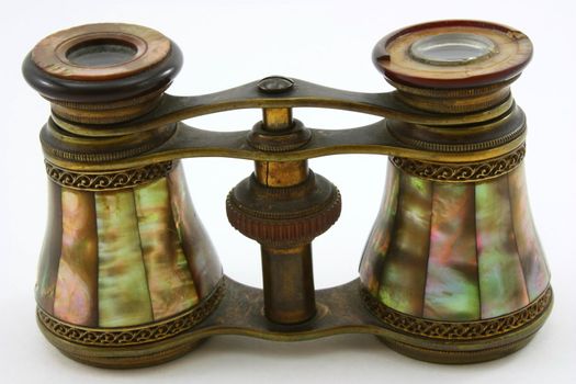 Antique opera glasses, with mother of pearl on white
