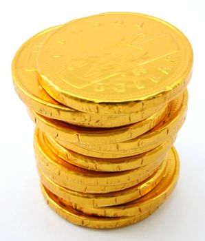 Single stack of chocolate gold coins, isolated on white background