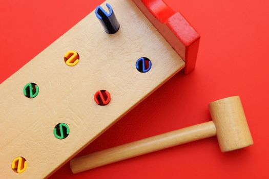Colorful wooden toy with hammer 