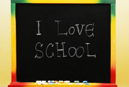 A blackboard with the inscription I love school