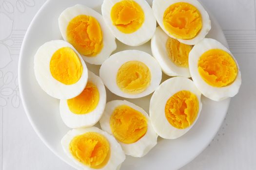 Boiled eggs on the white plate