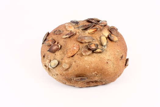 Pastry with pumpkin seeds, isolated