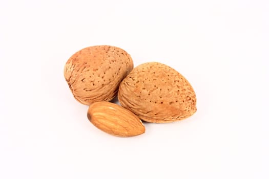 whole and shelled almonds isolated