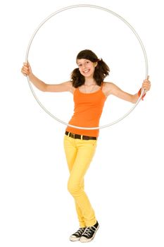 Joyful teenager girl with hula hoop on white background