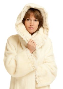 Beautiful lady in white fur coat and hood