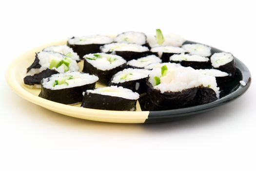 japanese sushi on a plate on a white background