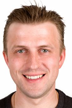 Portrait of the young smiling man. Face close up.