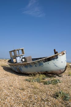 An old fishing boat on the beach at Dungeness