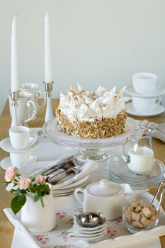 Beautiful cream cake on elegant served table