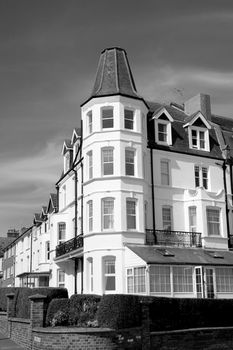 A victorian corner house with blue sky