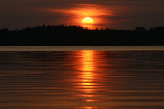 sunset over the water surface