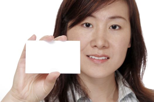 Business Card And Hand In Focus, Attractive Woman In Background