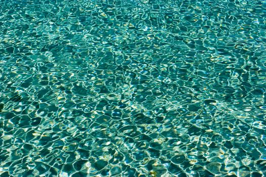 Turquoise water with ripples at Aegean sea