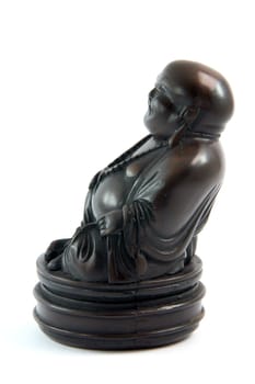 small black handcrafted buddha statue religious and decoration concepts