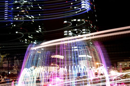 Fountain at Night with lighting intentionally blurr to produce stunning colors