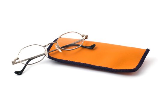 Eyeglasses and orange glasses case isolated on white