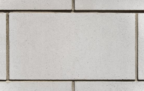 White brick block with space for text. Detail of a wall.