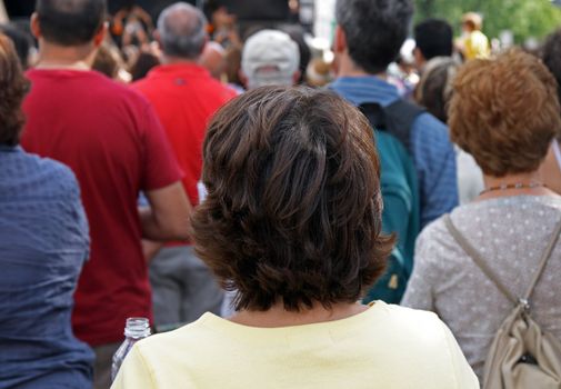 People watching a concert during a summer festival.