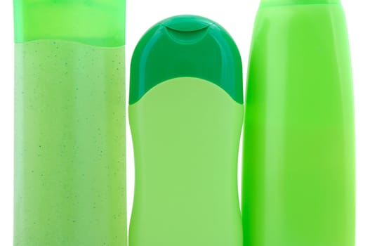 Three different  green beauty and hygiene products. On overwhite background.