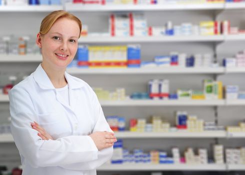 portrait of a female pharmacist at pharmacy