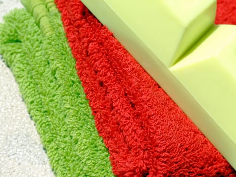 Two towels and a piece of soap