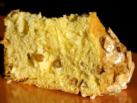 Slice of traditional italian Christmas cake Panettone