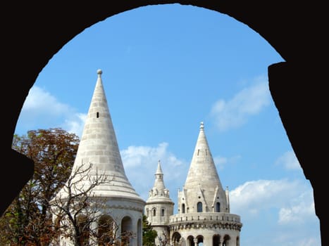 Fishermen Bastion is a terrace in neo-Gothic and neo-Romanesque style situated on the Buda bank of the Danube, on the Castle hill in Budapest, around Matthias Church. It was designed and built between 1895 and 1902 on the plans of Frigyes Schulek. Its seven towers represent the seven Magyar tribes that settled in the Carpathian Basin in 896.
The Bastion takes its name from the guild of fishermen which was responsible for defending this stretch of the city walls in the Middle Ages. It is a viewing terrace, with many stairs and walking paths.