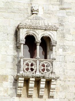 Detail of the balcony of Bel�m tower on river Tagus in Lisbon. It is considered one of the main works of the Portuguese late gothic and it is decorated with the typical manueline motifs like the armillary sphere (symbol of king Manuel I) and the cross of the military order of Christ