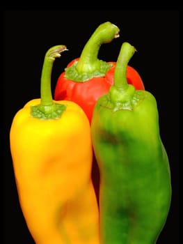 Yellow, red and green peppers