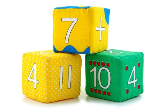 Child's cloth mathematical bricks (blocks) on overwhite background. 