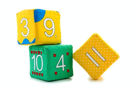 Child's cloth mathematical bricks (blocks) on overwhite background. 