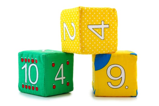 Child's cloth mathematical bricks (blocks) on overwhite background. 