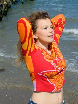 Blond woman relaxing on the beach