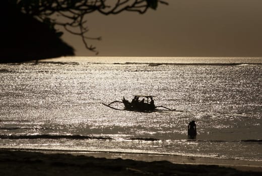 Sailing with a beautiful sunset in a tropical place