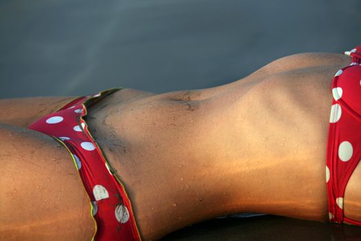 The beautiful girl on a coast of ocean