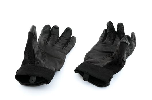 Black leather baseball batter gloves on white background.