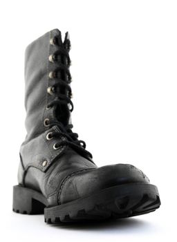 Army style black leather boot. Focus on the front part of the boot.