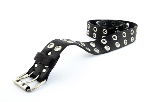 Black studded leather belt with metal buckle, on white background.