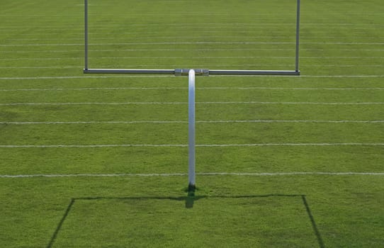 American football playing field with goal posts.