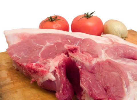 Ingridients for a meal. Meat is pork