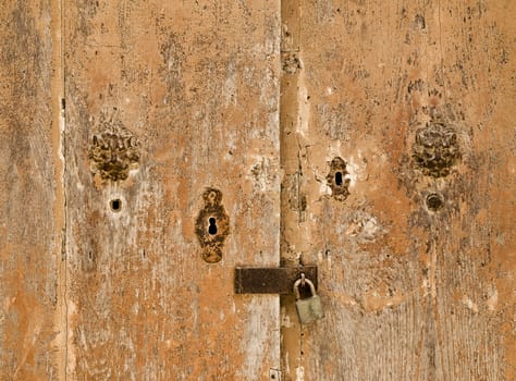 Authentic medieval lock and fittings on a door in Mdina on the island of Malta