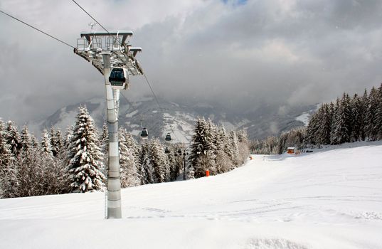 Alpine ski lift in Swiss Alps.