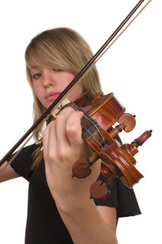 A beautiful young teenager playing her violin