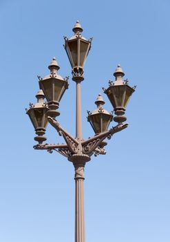 Street-lamp on a blue sky background on a sunny day