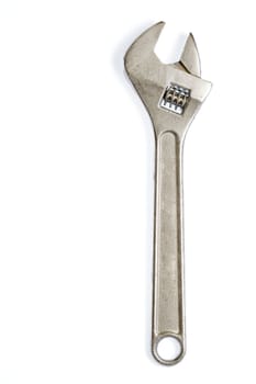 Chrome adjustable wrench isolated on a white background.